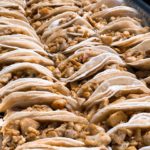 Interior of El Grullo Restaurant, a Mexican restaurant in San Jose CA featuring warm décor, colorful walls, and comfortable dining seating